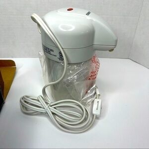 CONAIR Heated Lotion Dispenser